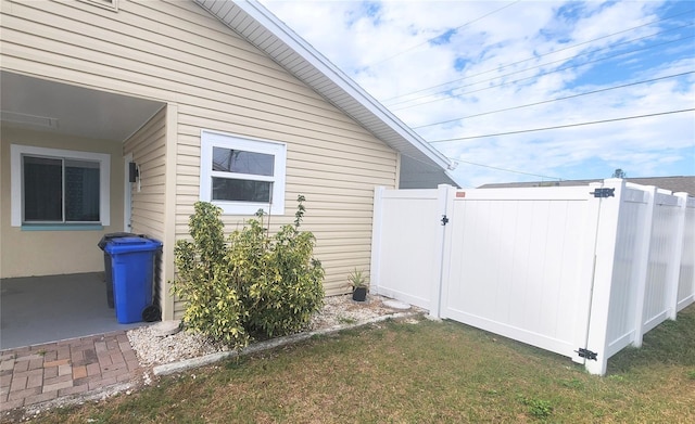 view of home's exterior featuring a lawn