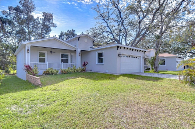 ranch-style home featuring covered porch, a garage, and a front lawn