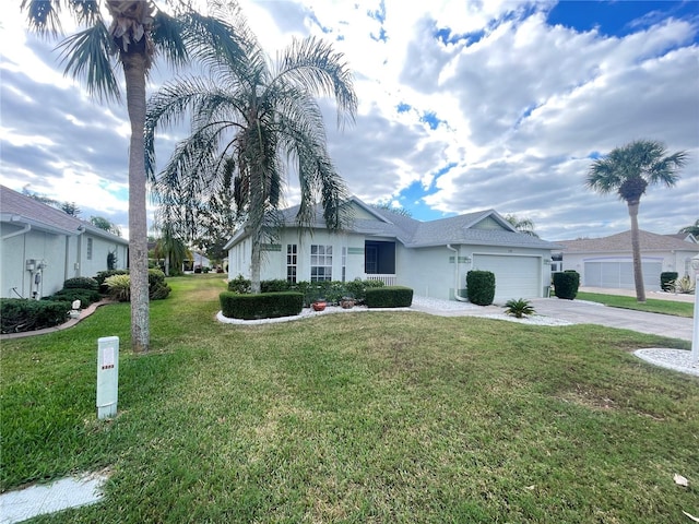 single story home with a front lawn and a garage