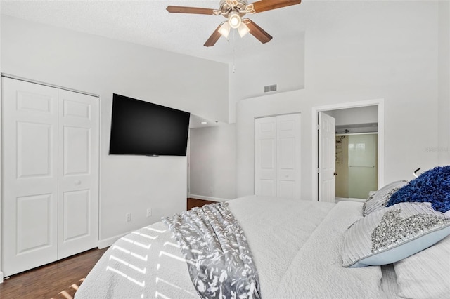 bedroom featuring ceiling fan and dark wood-type flooring