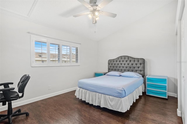 bedroom featuring vaulted ceiling, ceiling fan, and dark hardwood / wood-style floors