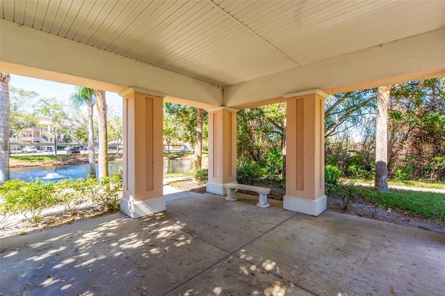 view of patio / terrace featuring a water view