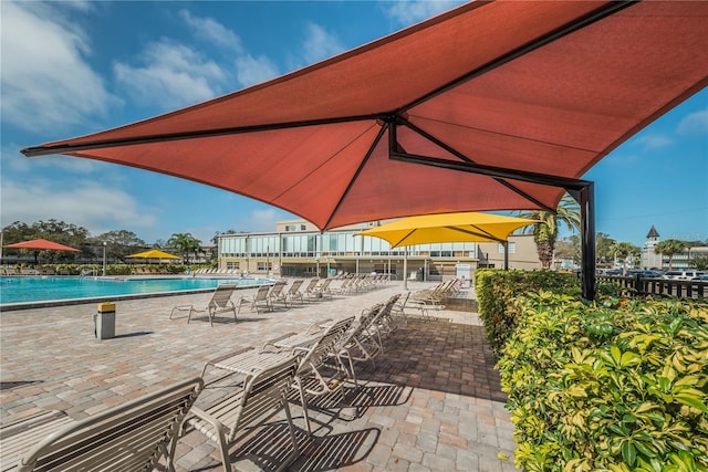 view of patio with a community pool