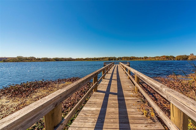 view of dock with a water view