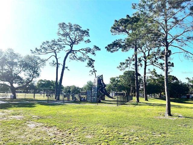 view of home's community featuring a lawn