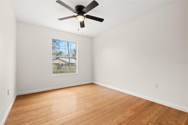 unfurnished room featuring light hardwood / wood-style floors and ceiling fan