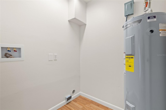 laundry room with electric water heater, hookup for a washing machine, wood-type flooring, and hookup for an electric dryer