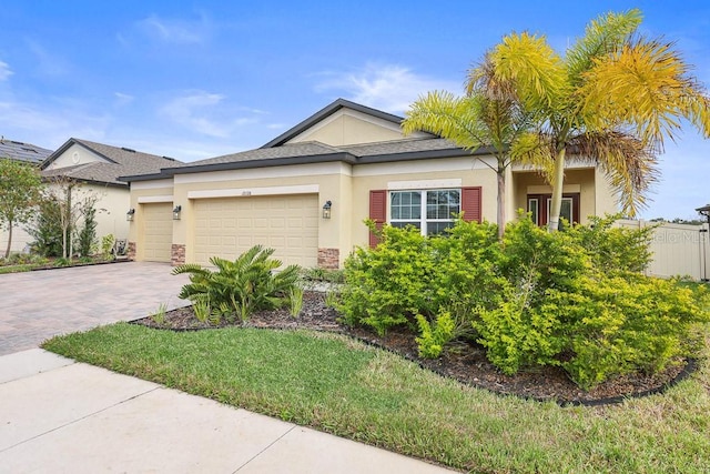 view of front of home with a garage