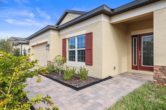 entrance to property with a garage