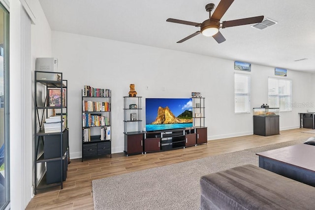 living room with ceiling fan