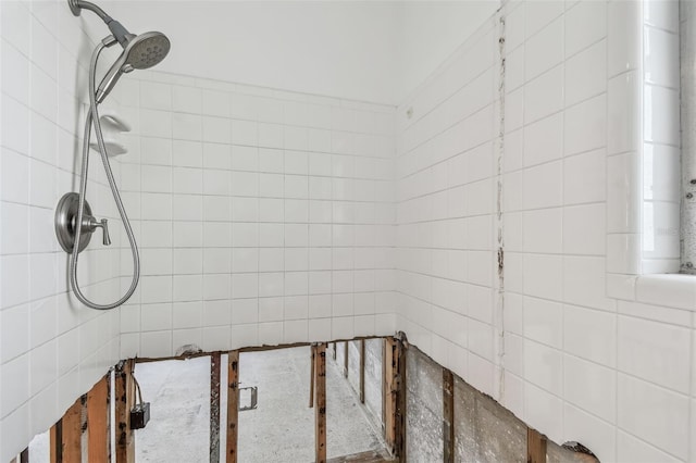 bathroom with a tile shower