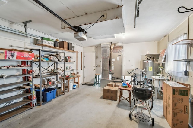 garage featuring electric water heater, a garage door opener, and heating unit