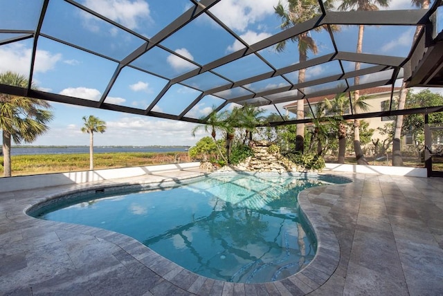 view of pool featuring a lanai and a patio