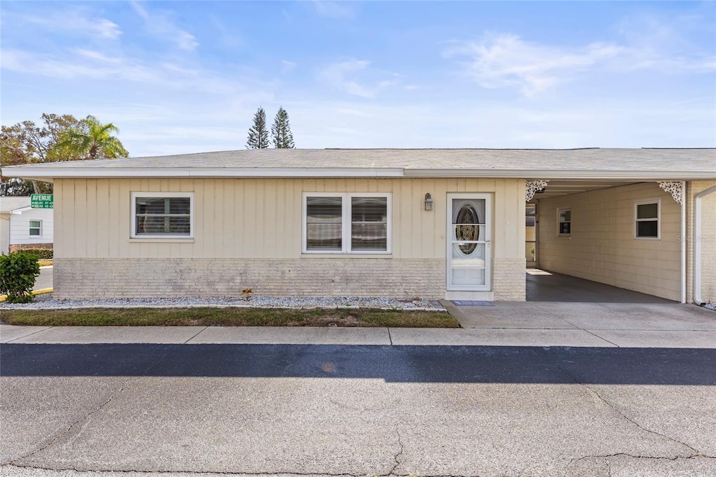 view of front of house featuring a carport