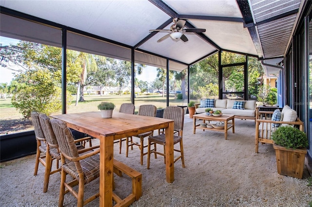 sunroom / solarium featuring vaulted ceiling and ceiling fan