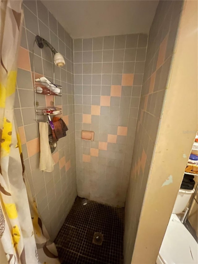 bathroom with a shower with shower curtain