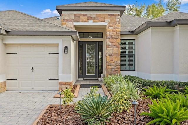 property entrance with a garage