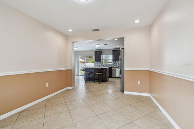 interior space featuring light tile patterned floors