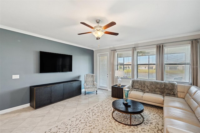 living room with ceiling fan, crown molding, and light tile patterned flooring