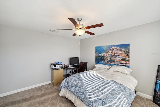 bedroom featuring ceiling fan and carpet floors