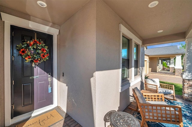 doorway to property with a porch