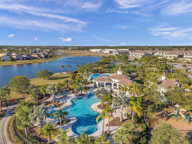 birds eye view of property featuring a water view