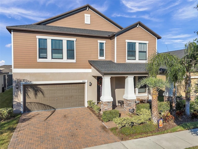 craftsman-style house featuring a garage