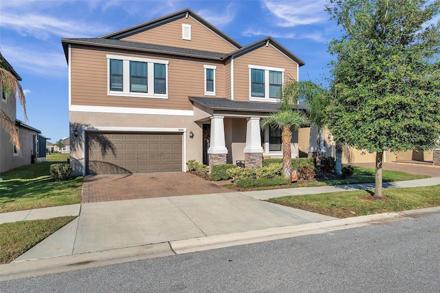 view of front of property featuring a garage