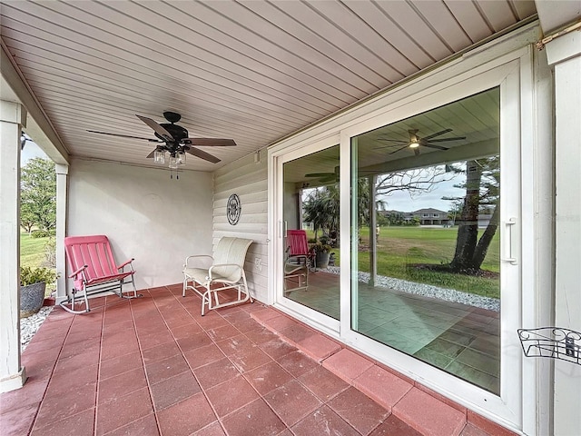 view of patio with ceiling fan