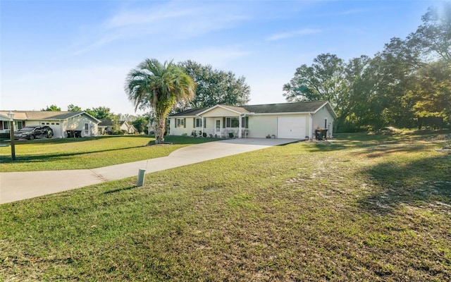 ranch-style home featuring a garage and a front yard