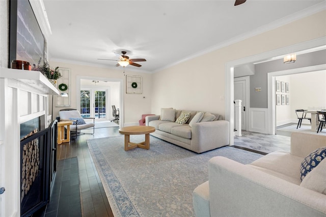 living room with french doors, ceiling fan, crown molding, and wood-type flooring