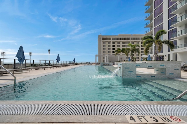 view of swimming pool with a patio area