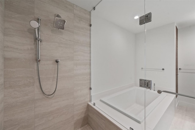 bathroom with independent shower and bath