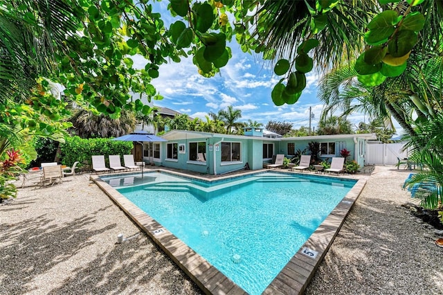 view of swimming pool featuring a patio area