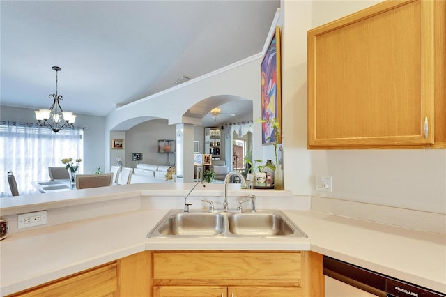 kitchen featuring dishwashing machine, sink, and light brown cabinets