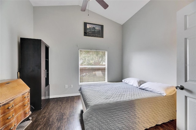 bedroom featuring dark hardwood / wood-style flooring, high vaulted ceiling, and ceiling fan