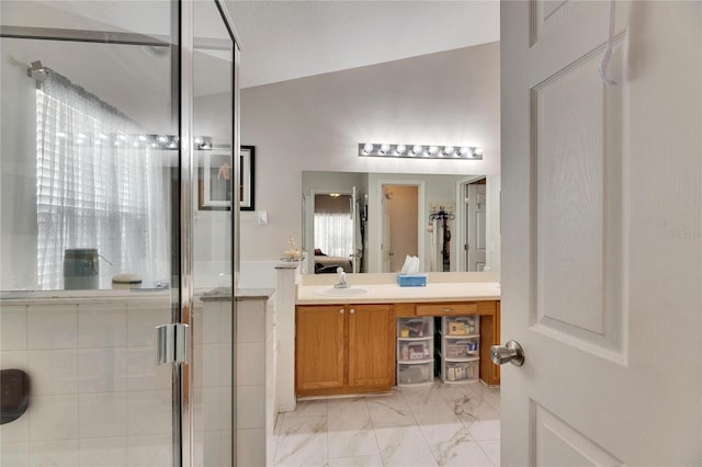 bathroom featuring vanity and walk in shower