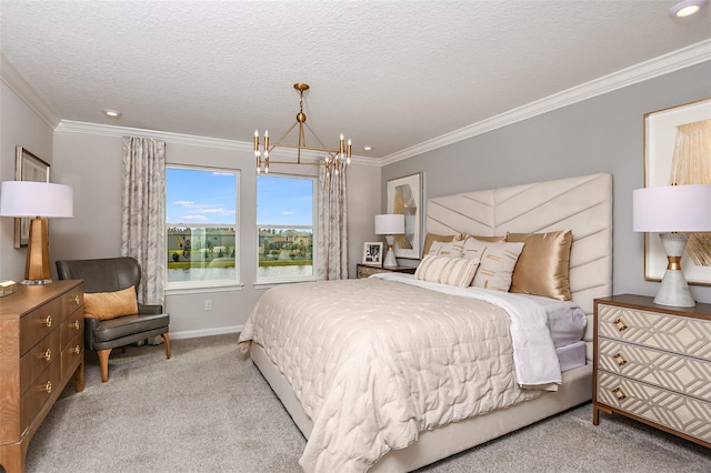 carpeted bedroom with a notable chandelier, a water view, a textured ceiling, and ornamental molding