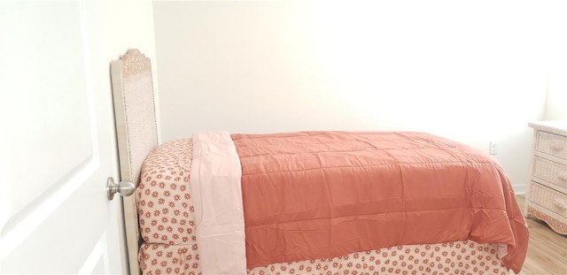 bedroom featuring light hardwood / wood-style floors