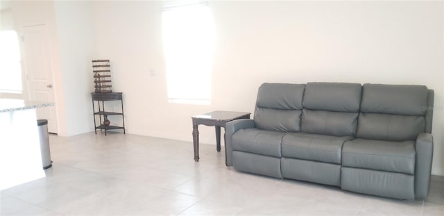 living room with light tile patterned floors