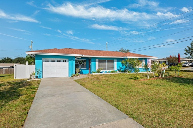 ranch-style house with a front lawn and a garage