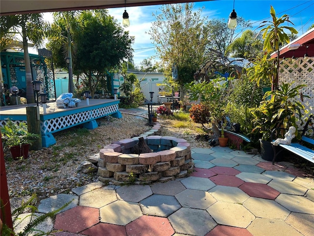 view of patio / terrace with a fire pit