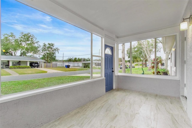 view of unfurnished sunroom