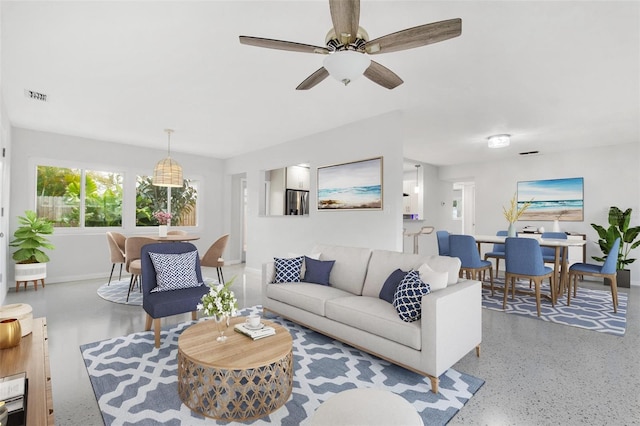 living room with ceiling fan