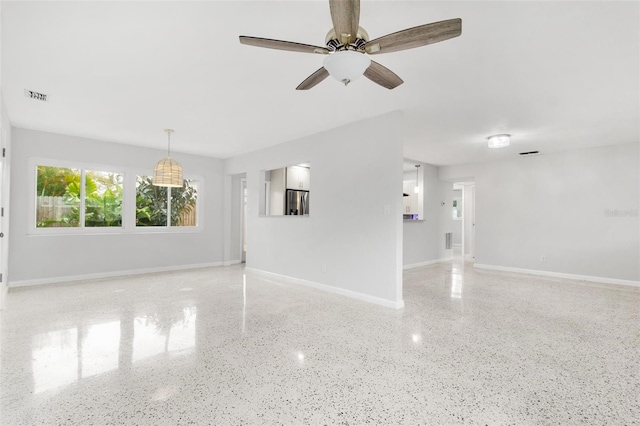 empty room featuring ceiling fan