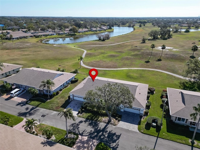 drone / aerial view featuring a water view