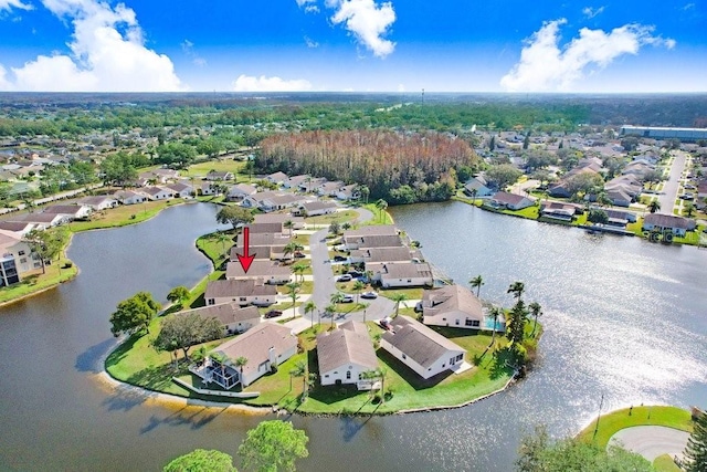 drone / aerial view with a water view