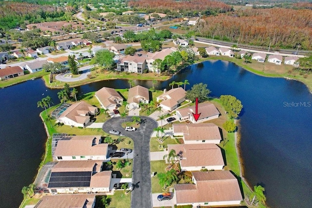 drone / aerial view with a water view