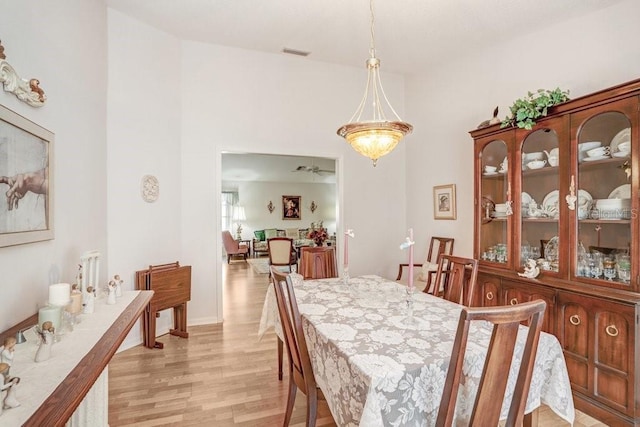 dining area with light wood-type flooring