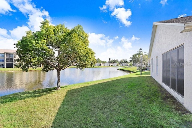 view of yard with a water view